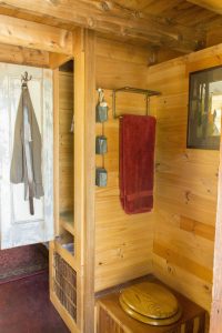 Dee's Kozy Kabin Tiny House Toilet Nook, Closet Door Open
