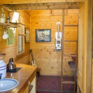 Dee's Kozy Kabin Tiny House Entry and Living Area Vertical View
