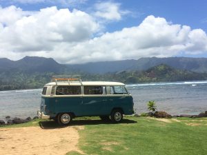 A VW van in Hawaii by the ocean